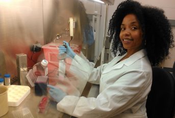 AAUW 2018-19 Community Action Grantee Marisa Madison working in her lab.