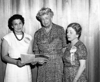 Black and white photo of Eleanor Roosevelt at the AAUW National Convention in June 1959 with two AAUW members.