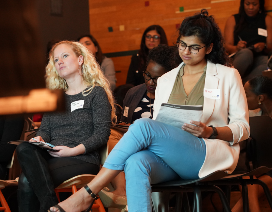 Two audience members participating at the Empower event in Atlanta