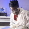 2007-08 American Fellow Esther Ngumbi working in her lab