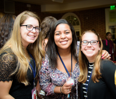 Three young women at the National Conference for College Women Student Leaders