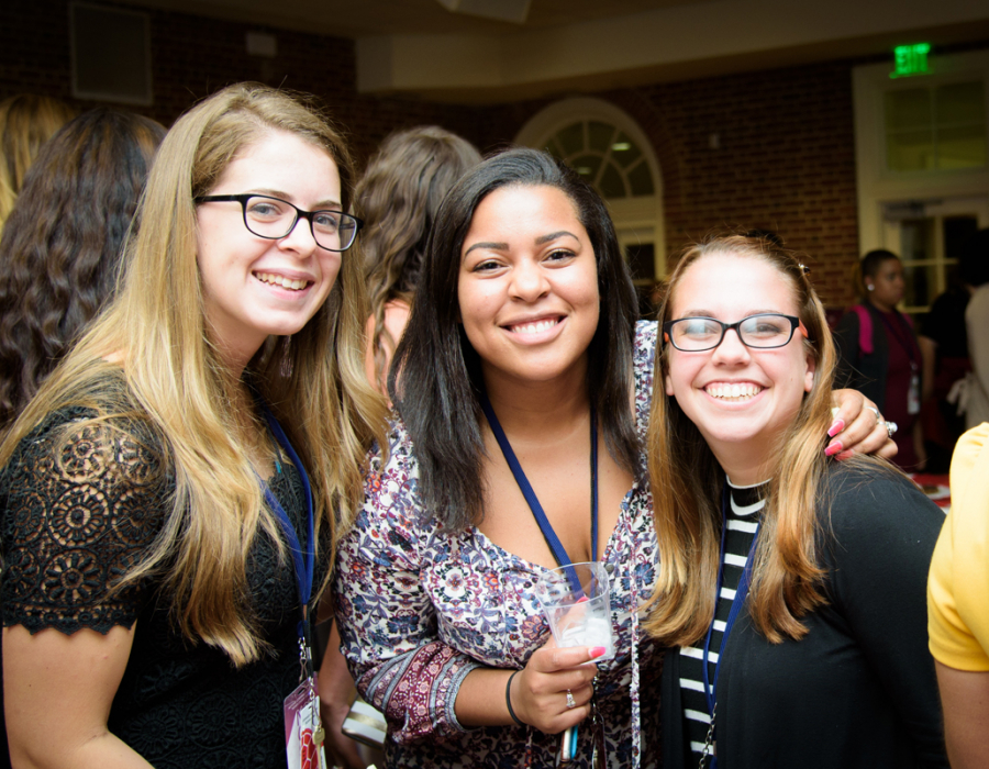 Three young women at the National Conference for College Women Student Leaders