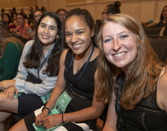 Three young women attending the 2018 National Conference for College Women Student Leaders