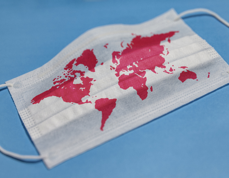 Surgical mask with world map printed on it.