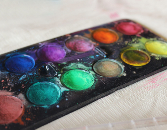 palette of paint (photo by Jen Theodore for Unsplash)