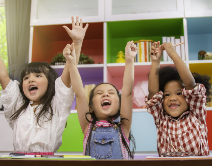 Group of preschool kids looking happy and excited