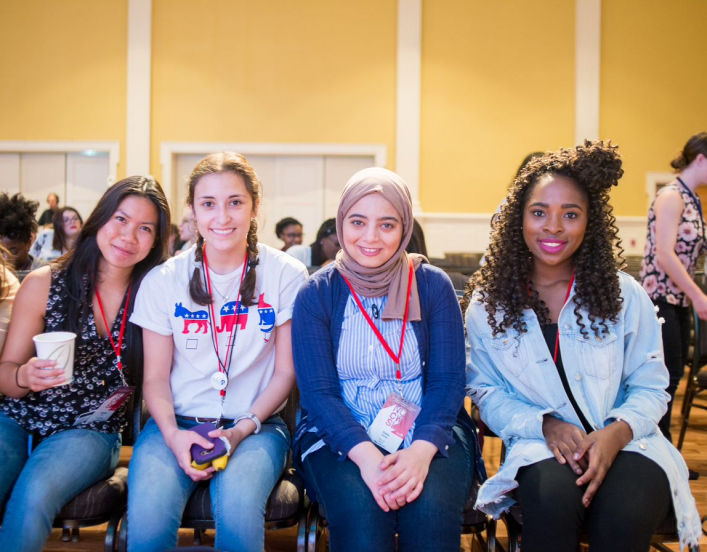 Four students at the National Conference for College Women Student Leaders