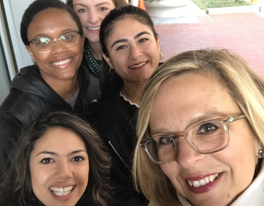 Kim Churches CEO AAUW with colleagues and interns