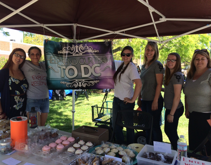Women selling cupcakes at an AAUW fundraiser at Sierra College