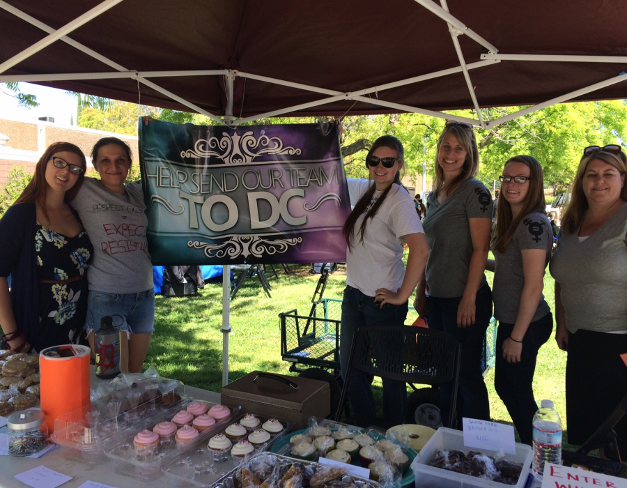 Women selling cupcakes at an AAUW fundraiser at Sierra College