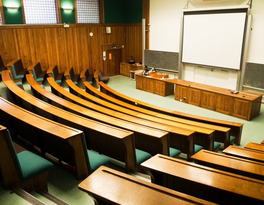 Photo of empty university lecture hall.
