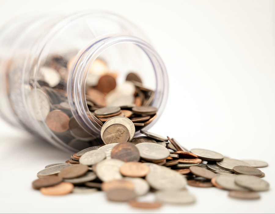 A jar of coins spilled over