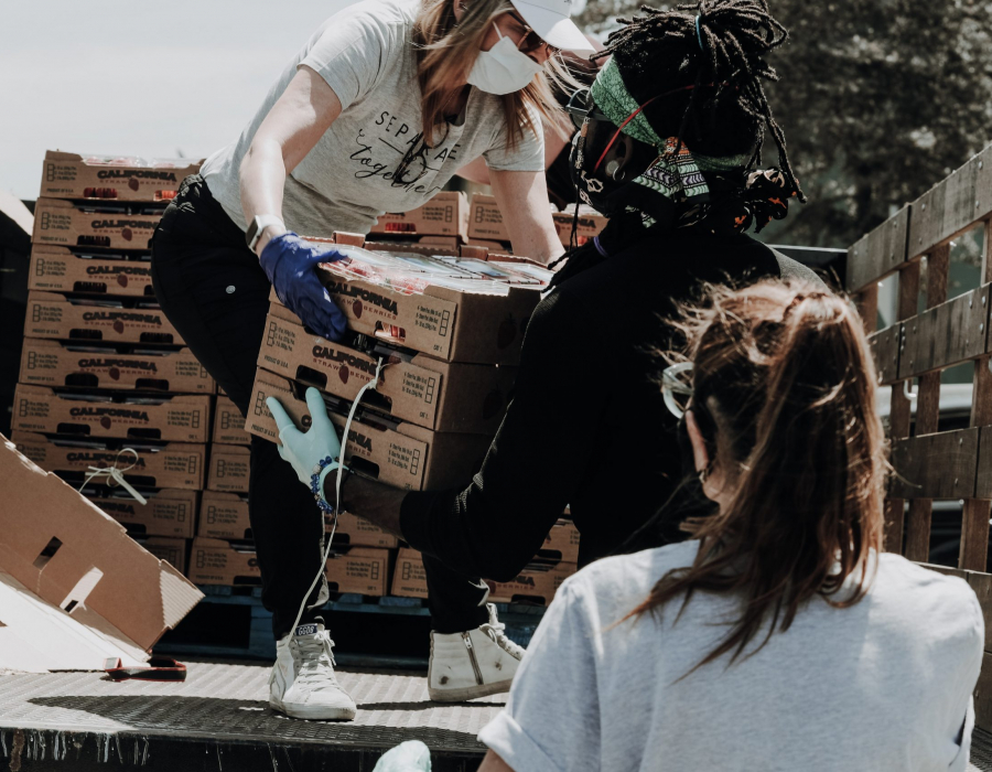 Two women doing volunteer work