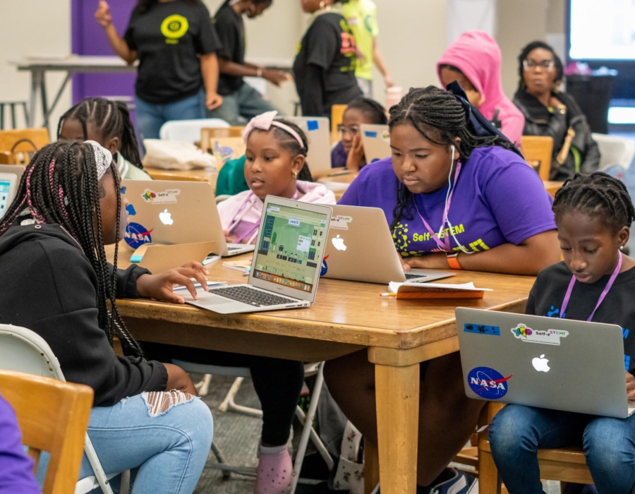 Girls hard at work at the Self-eSTEM STEM Camp.